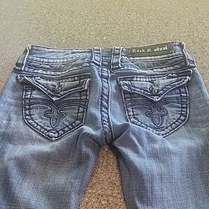 Rock Revival Blue Jeans with Distinctive Stitching